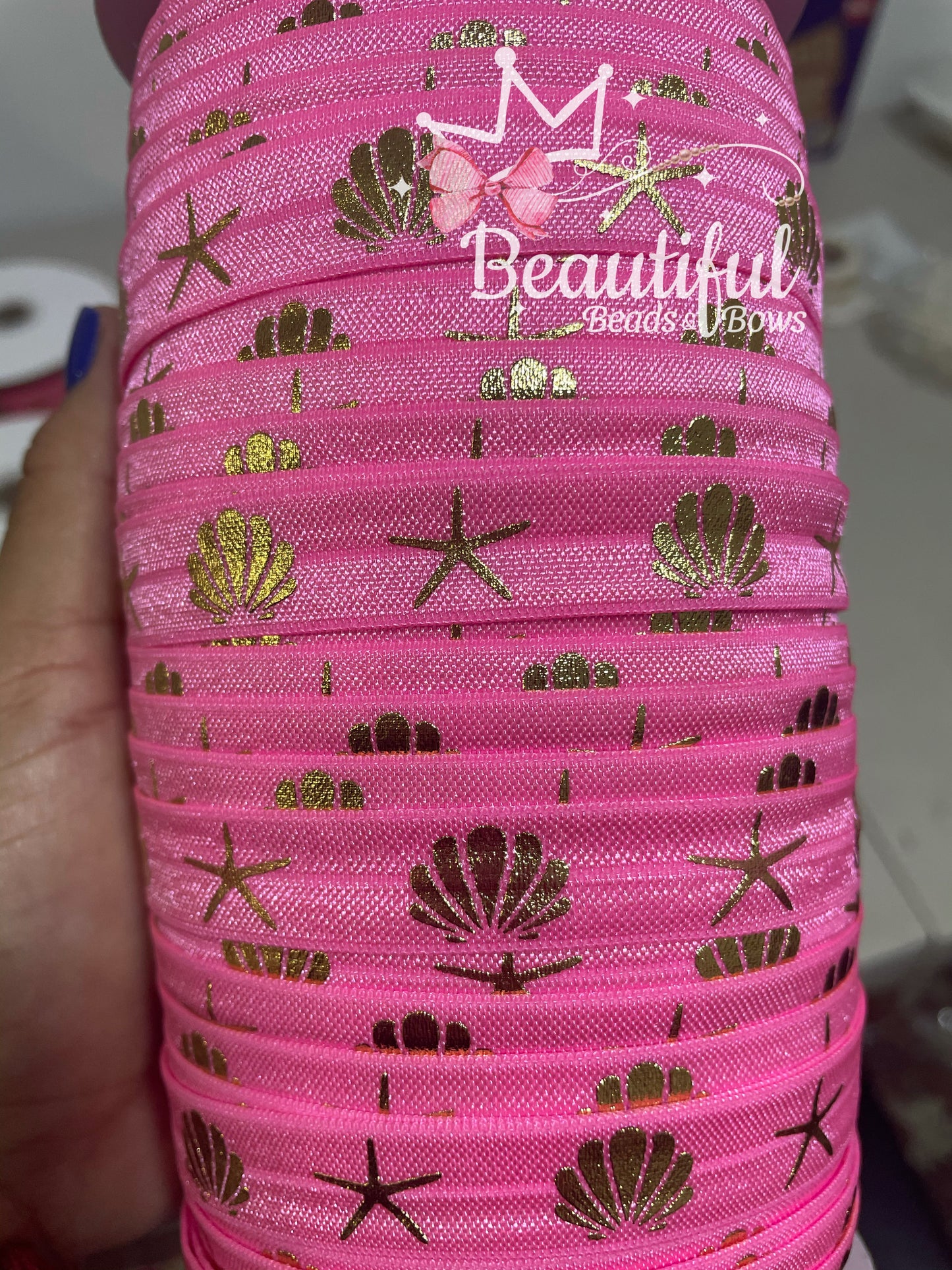 Elástico Foe (estrella de mar y concha)