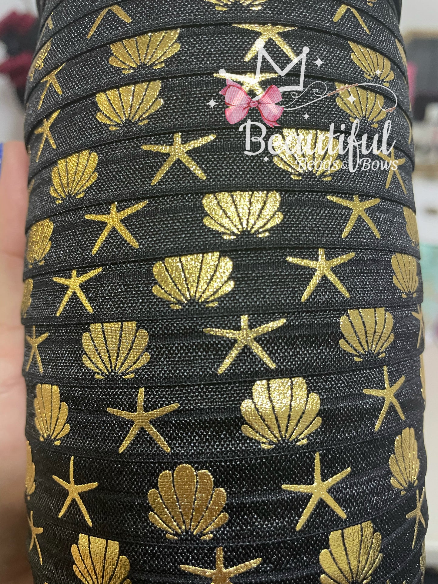 Elástico Foe (estrella de mar y concha)