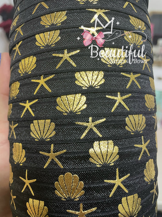 Elástico Foe (estrella de mar y concha)