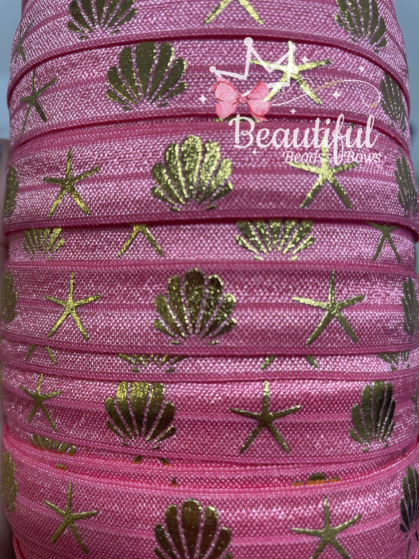 Elástico Foe (estrella de mar y concha)