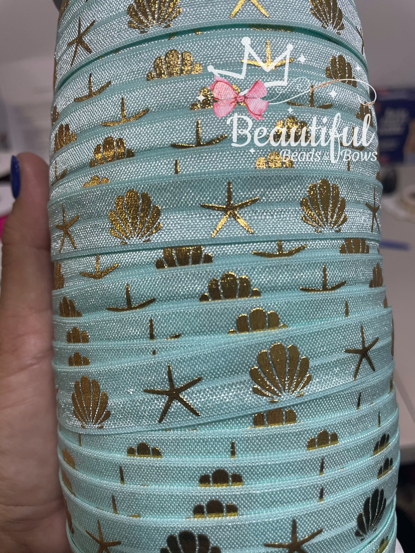 Elástico Foe (estrella de mar y concha)